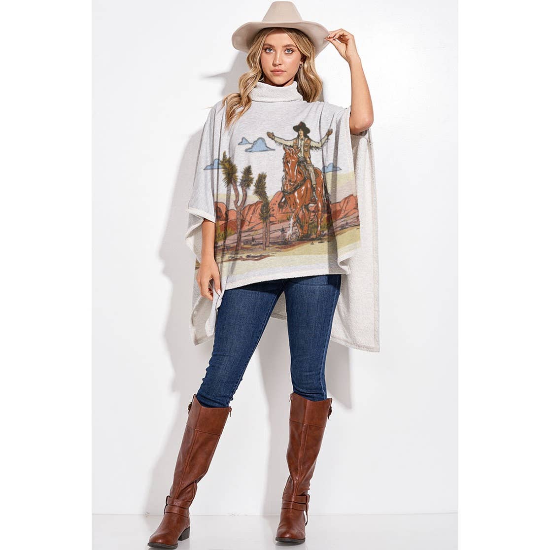 Women wearing a beige cowboy hat Gray poncho, jeans and brown boots