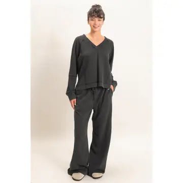 Woman wearing black top and pants