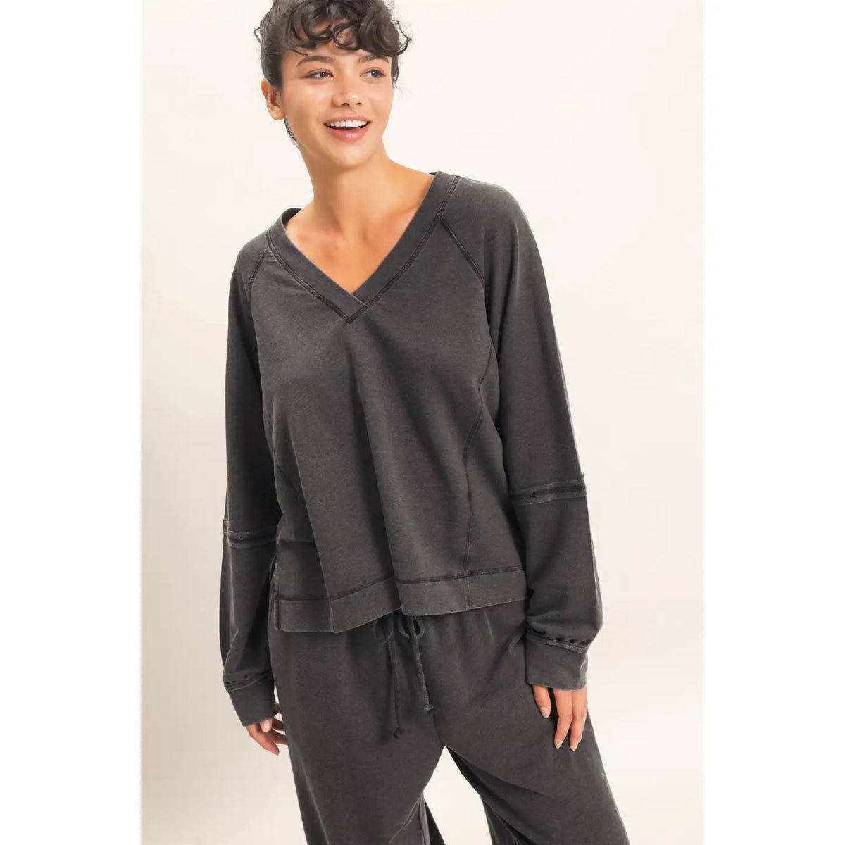 Close Up of Woman Wearing Black Top and Pants