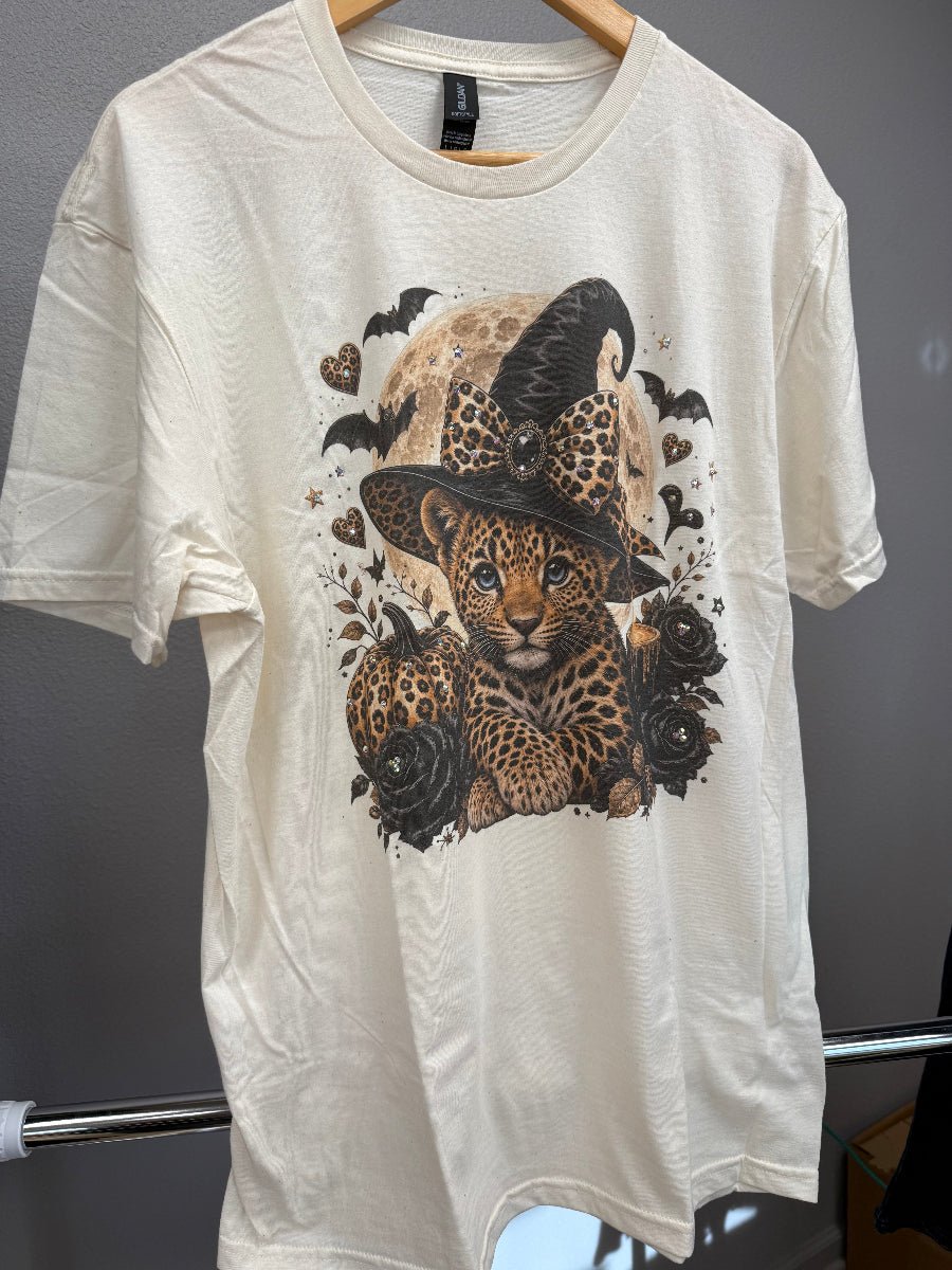 Cream T-Shirt On Hanger Print On Shirt Leopard Kitten Wearing A Witches Hat