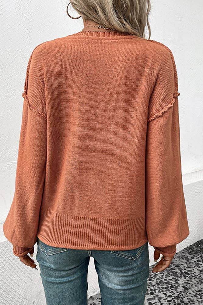 Back View of Sweater and Jeans