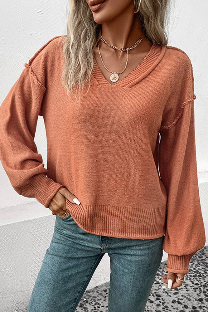 Model Wearing A Coffee Sweater and Jeans