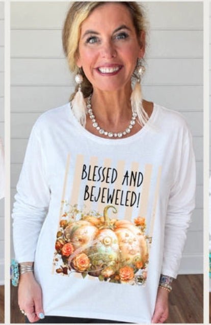 Model wearing white t-shirt with graphic Blessed and Bejeweled with Pumpkin