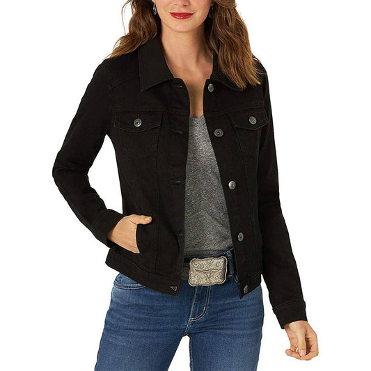 Woman wearing a black jacket with a plain background