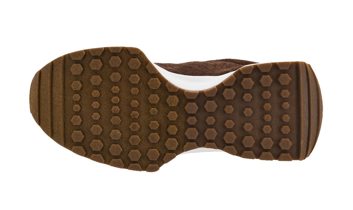 Brown Bottom Sole Of a Tennis Shoe
