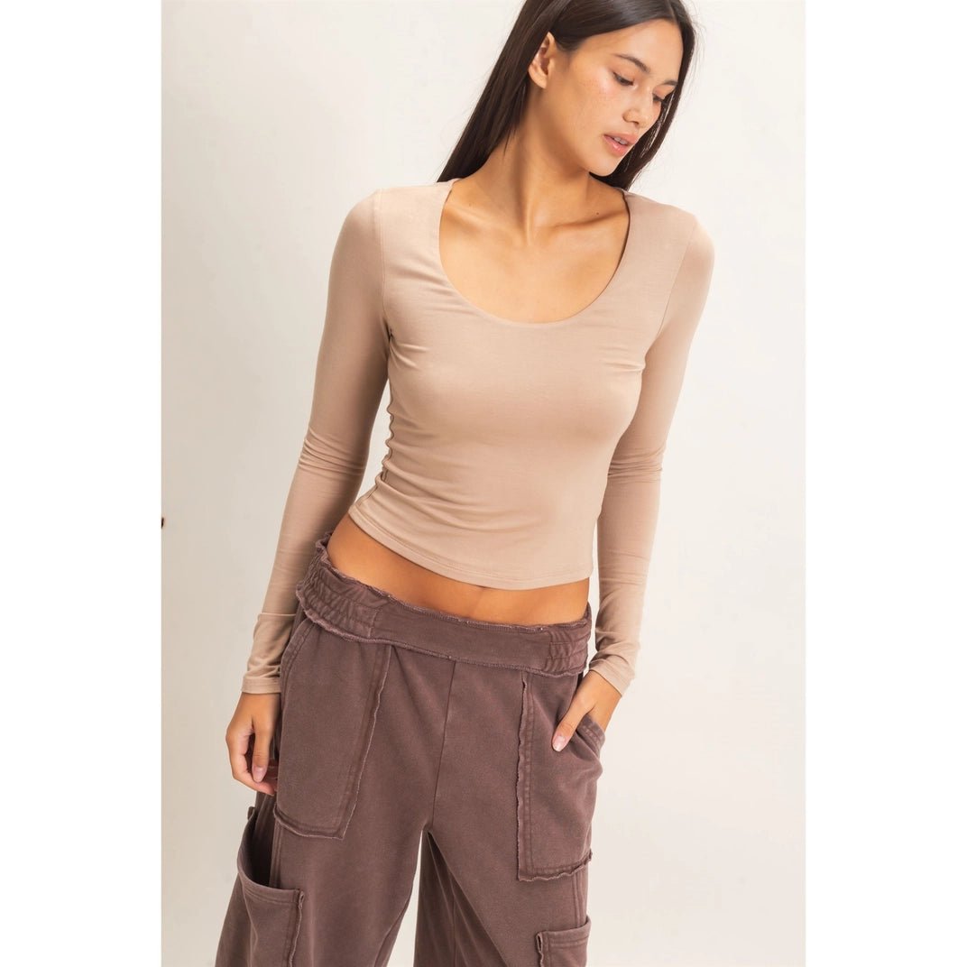 Female Wearing Cream Scoop Neck T-Shirt and Brown Joggers